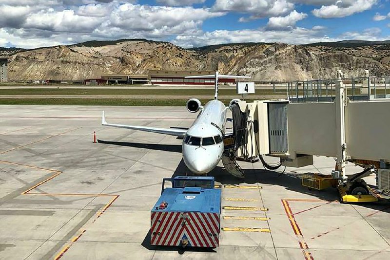 An American Airlines jet sits parked at Colorado’s Eagle County Airport in Gypsum, Colo. The carrier said Thursday that it is increasing July flights by 74%, a sign that U.S. travelers are returning more quickly than expected.
(The Colorado Sun/Jason Blevins)