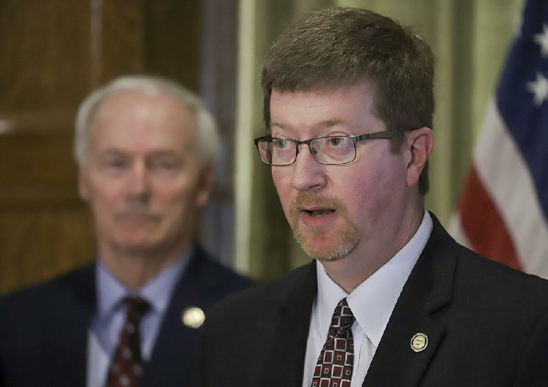 Johnny Key, right, Secretary of the Arkansas Department of Education, is shown  with Governor Asa Hutchinson in this  April 6, 2020 file photo.
(Arkansas Democrat-Gazette/ John Sykes Jr.)