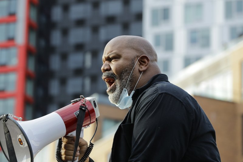 Pastor James Roberson leads a prayer with protesters during the Prayerful Protest march for George Floyd, on Tuesday, in the Brooklyn borough of New York. Floyd died after being restrained by a Minneapolis police officer on Memorial Day.
(AP/Frank Franklin II)