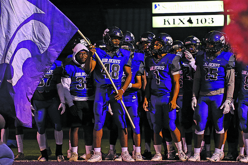 El Dorado's football team prepares to take the field against Benton in action last season at Memorial Stadiuim. The Wildcats will host North Little Rock in the preseason benefit game on Aug. 28.