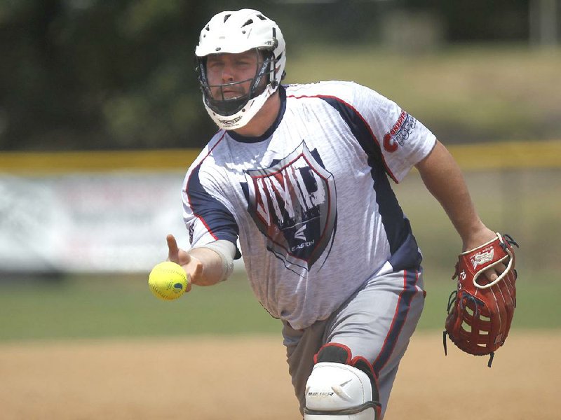 Ryan Dacko pitches for Vivid during a 2018 Busch Softball Classic game. Competitors in this year’s tournament, tentatively scheduled for July 3-5, will take precautions that meet the state’s guidelines for safety amid the coronavirus pandemic.
(Arkansas Democrat-Gazette/Thomas Metthe)