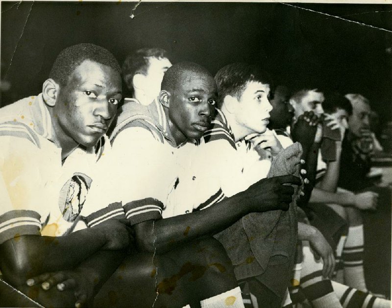 Almer Lee (center) was one of the first athletes to transfer from Fort Smith Lincoln to Fort Smith Northside, where he helped the Grizzlies win a state title in 1968. Lee, who was the first black basketball player to play at Arkansas, was named Southwest Conference sophomore of the year in the 1969-70 season.
(NWA Democrat-Gazette file photo)