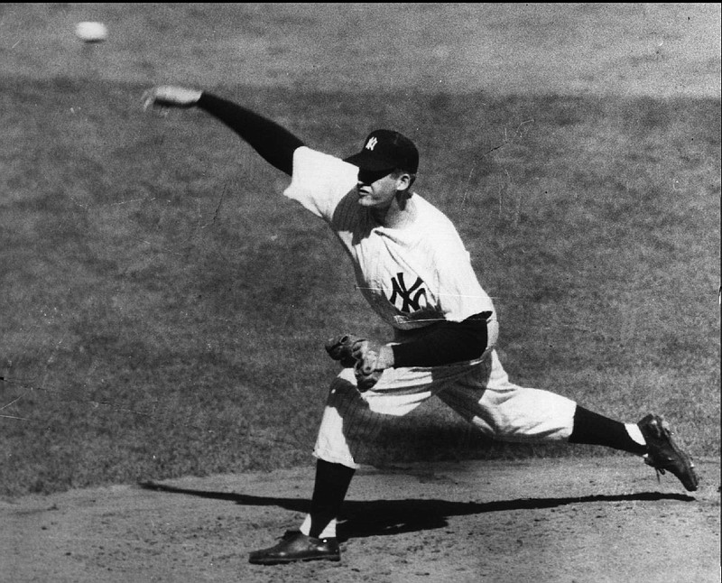 New York Yankees right hander Don Larsen pitches in this Oct. 8, 1956, file photo, during the fourth inning against the Brooklyn Dodgers in Game 5 of the 1956 World Series. Larsen was the first pitcher to throw a perfect game in the World Series.

(AP)