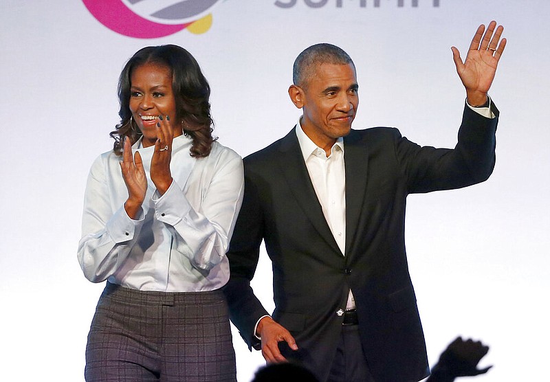 Former President Barack Obama and former first lady Michelle Obama appear at the Obama Foundation Summit in Chicago in this Oct. 31, 2017, file photo. The president said in a commencement speech Sunday, June 7, 2020, that the nationwide protests after the recent deaths of unarmed black women and men, including George Floyd, were fueled from "decades worth of anguish, frustration, over unequal treatment and a failure to perform police practices."