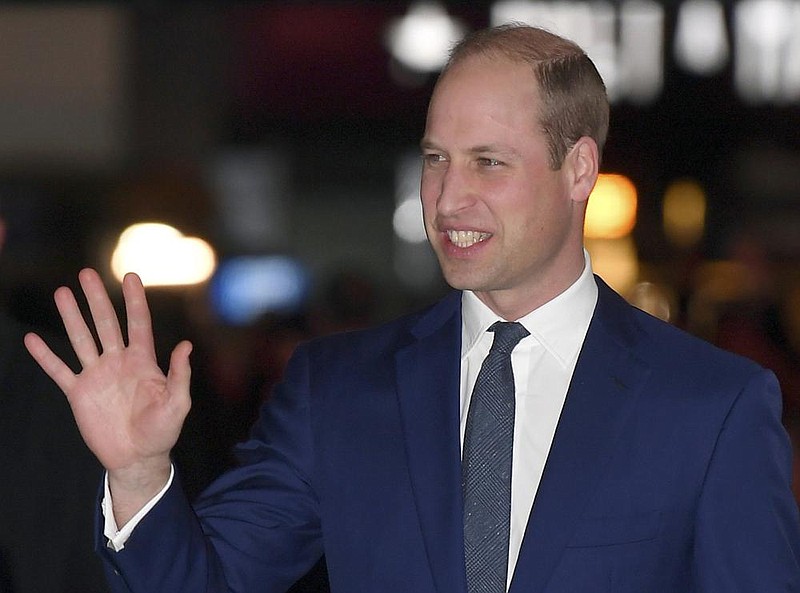  In this Thursday Nov. 21, 2019 file photo, Britain's Prince William waves as he arrives at the Tusk Conservation Awards in London.  (Toby Melville/Pool via AP, File)
