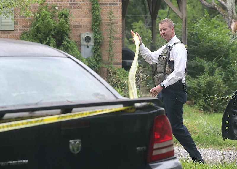 Garland County Under Sheriff Jason Lawrence arrives at the scene of a shooting Monday at 360 Westinghouse Road. - Photo by Richard Rasmussen of The Sentinel-Record
