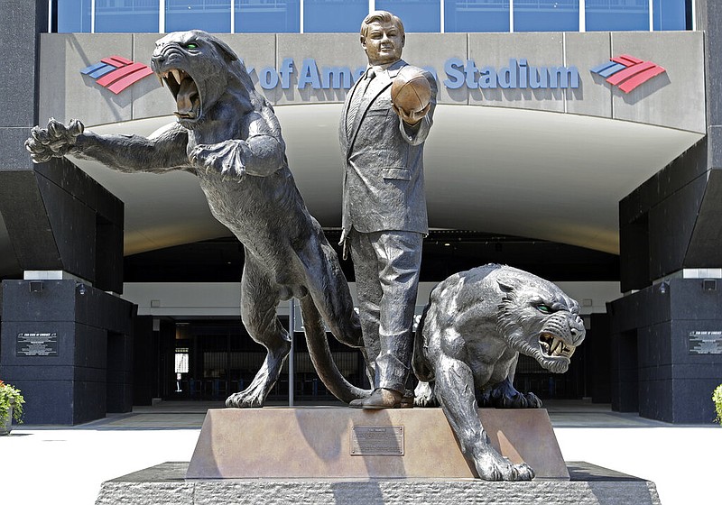 A statue of former Carolina Panthers owner Jerry Richardson stands outside an entrance to Bank of America Stadium in Charlotte, N.C., in this July 10, 2018, file photo.