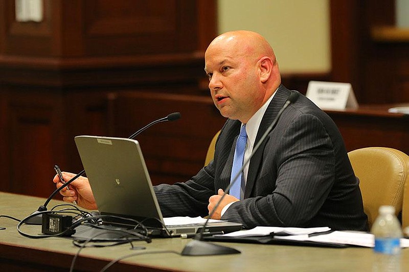 12/5/14
Arkansas Demorcrat-Gazette/STEPHEN B. THORNTON
State Lottery Director Bishop Woosley addresses the Arkansas Lottery Commission Legislative Oversight  Committee meeting at the State Capitol in Little Rock.