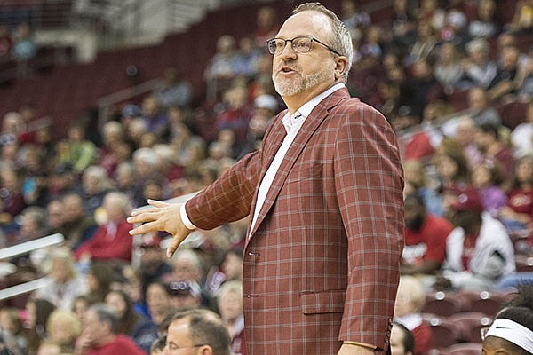 Arkansas women's basketball coach Mike Neighbors is shown during a game against Arkansas-Little Rock on Saturday, Dec. 21, 2019, at Simmons Bank Arena in North Little Rock. 