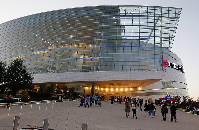 People stream into the BOK Center in Tulsa in this Thursday, Oct. 12, 2017, file photo. The center has been selected as the site of President Donald Trump's first rally since the coronavirus pandemic began in the United States.