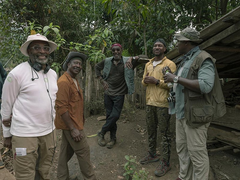 Spike Lee poses with cast members Clarke Peters, Delroy Lindo and Jonathan Majors in Thailand on the set of his epic Da 5 Bloods.