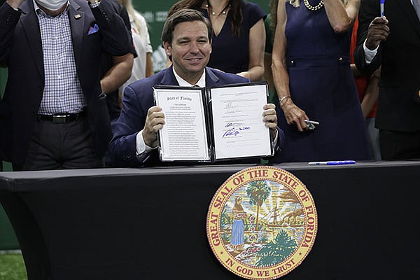 Florida governor signs NIL legislation | Whole Hog Sports