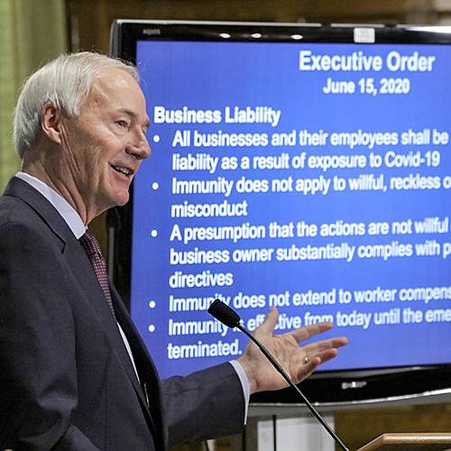 Gov. Asa Hutchinson discusses executive orders he signed Monday regarding Arkan- sas’ efforts to cope with the covid-19 pandemic. More photos at arkansasonline. com/616govcov/. 
(Arkansas Democrat-Gazette/ John Sykes Jr.) 