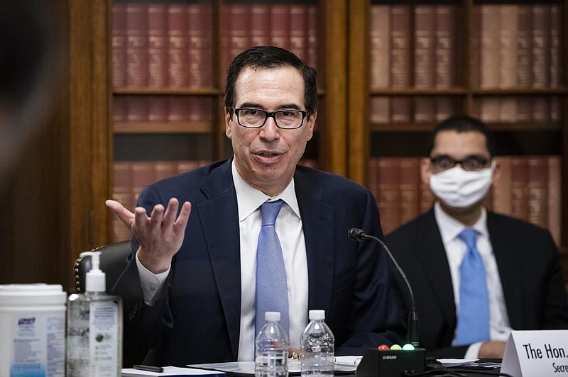 Treasury Secretary Steven Mnuchin, who last week told a Sen- ate committee that the identities of businesses receiving funds through the Paycheck Protection Program would remain secret, said Monday on Twitter that he will discuss adding “proper over- sight” of the program. 
(AP/Al Drago) 
