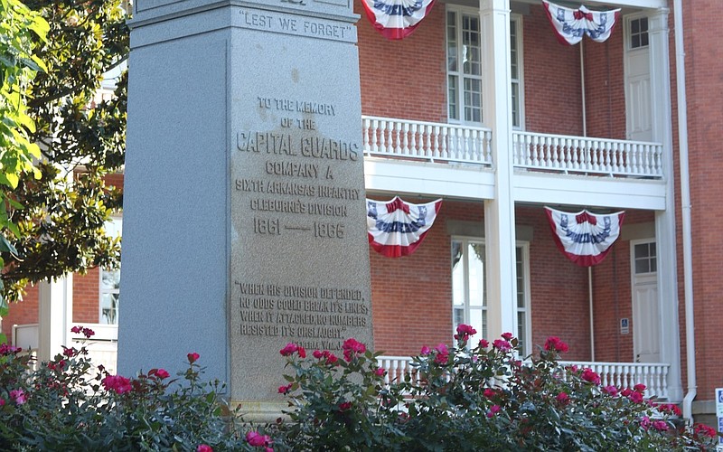 The base of the Memorial to Company A, Capitol Guards, a Confederate monument in MacArthur Park at Little Rock, is discolored on Wednesday, June 17, 2020. The statue atop the base, which portrays one of the guards during the Civil War, was apparently unaffected.