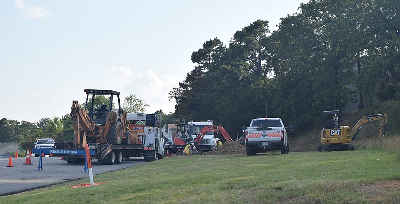 Crews work at the scene of a gas explosion and fire in Maumelle on Thursday, June 18, 2020.