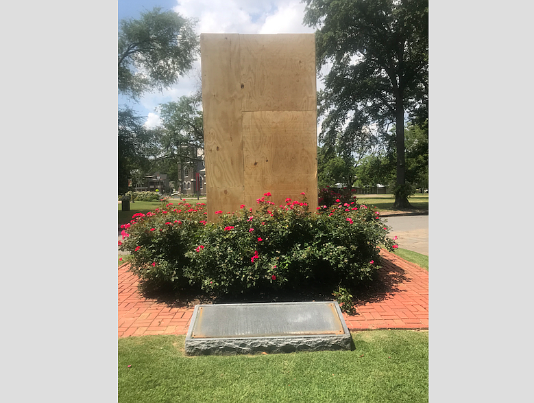 A statue dedicated to a unit of Arkansas Confederate soldiers was removed Thursday from its place outside the MacArthur Museum of Arkansas Military History.