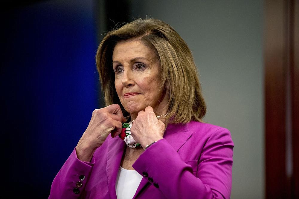 House Speaker Nancy Pelosi, shown Tuesday, on Wednesday called the Senate’s police legislation “inadequate” but said House Democrats hope to help craft a measure that helps end “the epidemic of racial injustice and police brutality in America.”
(AP/Andrew Harnik)