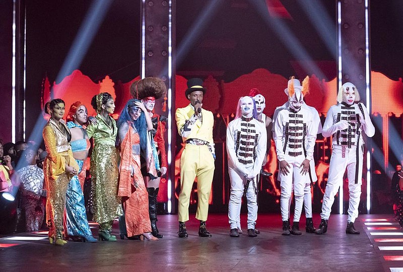 Dashaun Wesley, center, is the ring leader for contestants on the series Legendary. The series lifts the veil off the underground world of ballroom culture, in which historically black and Latino LGBT youths compete in elaborate performances on a runway.
(HBO Max via AP)