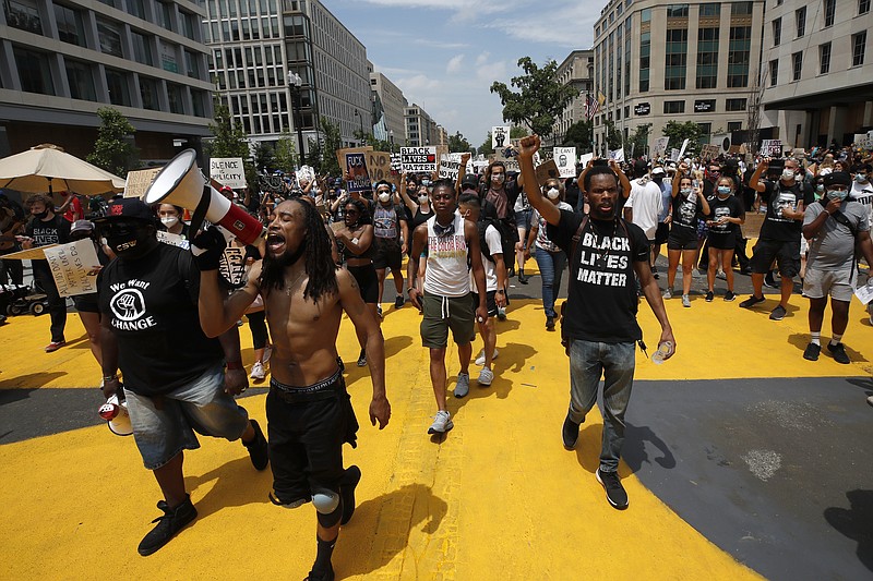 Demonstrators protest June 6 near the White House in Washington over the death of George Floyd.
(AP/Alex Brandon)