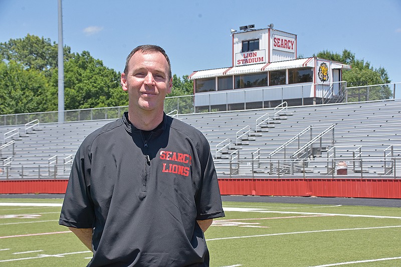 Kenny Simpson is the new head football coach at Searcy High School. He replaces Mark Kelley, who led the Lions to its first football state championship last fall. Kelley resigned earlier this month to take an assistant coaching position at Conway High School.