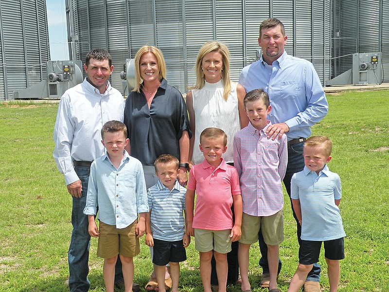 The Thaxton Brothers Partnership in Carlisle is the 2020 Lonoke County Farm Family of the Year. Members of the family include, back row, from left, Clayton and Elizabeth Thaxton, and their children, front row, from left, Collin, 7, and Bentley, 4. In the back row, third from left, are Lindsey and Keaton Thaxton and their children, front row, third from left, Steele, 4; Fisher, 10; and Cash, 4.