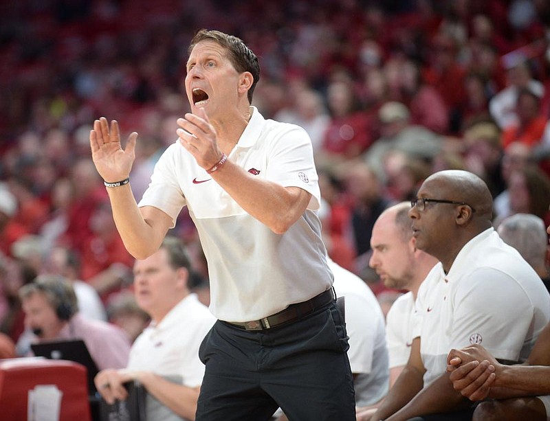 NWA Democrat-Gazette/ANDY SHUPE
Arkansas coach Eric Musselman directs his players Saturday, Nov. 16, 2019, during the second half of play against Montana in Bud Walton Arena in Fayetteville. Visit nwadg.com/photos to see more photographs from the game.