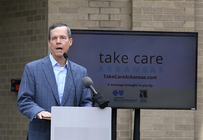 University of Arkansas for Medical Sciences Chancellor Dr. Cam Patterson speaks Tuesday at the kickoff for the Take Care Arkansas campaign at the Little Rock Regional Chamber of Commerce. More photos at arkansasonline.com/624care/. (Arkansas Democrat-Gazette/Staton Breidenthal) 
