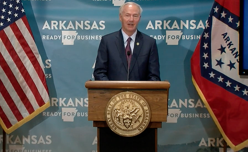 Arkansas Gov. Asa Hutchinson speaks to reporters at the state Capitol in Little Rock on Thursday in this still of video provided by the governor's office. 