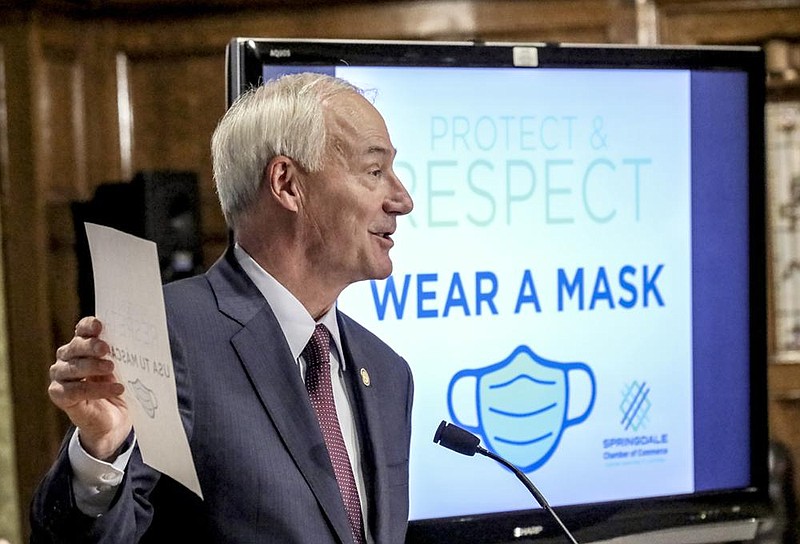 Governor Asa Hutchinson talks about an initiative by the Springdale Chamber of Commerce encouraging Arkansans to wear masks. He and other state officials briefed the press on the states COVID-19 response. The event was held at the Governors Conference Room at the state Capitol in Little Rock on Thursday, June 25. (Arkansas Democrat-Gazette/ John Sykes Jr.)