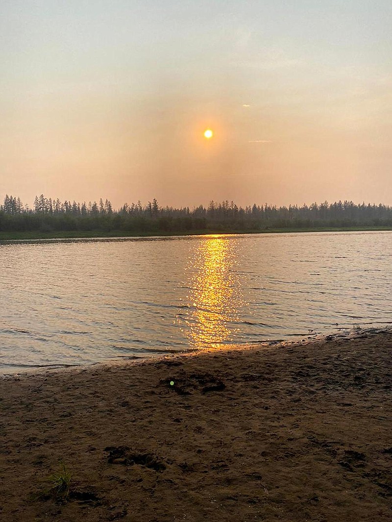 A beach along the Yana River outside Verkhoyansk, Russia, sits empty Tuesday as a heat wave continues. Arctic regions in Russia are among the fastest-warming areas in the world.
(AP/Olga Burtseva)