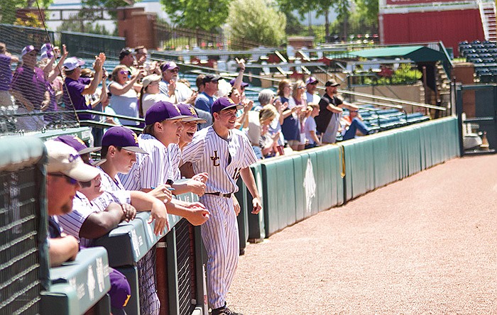 Elizabeth Green/For the News-Times In this file photo, members of Junction City's baseball team look on during the 2019 state championship game against Woodlawn in Fayetteville. With a powerful offense and an outstanding pitching staff, the Dragons went 9-0 in the postseason to win the state crown.