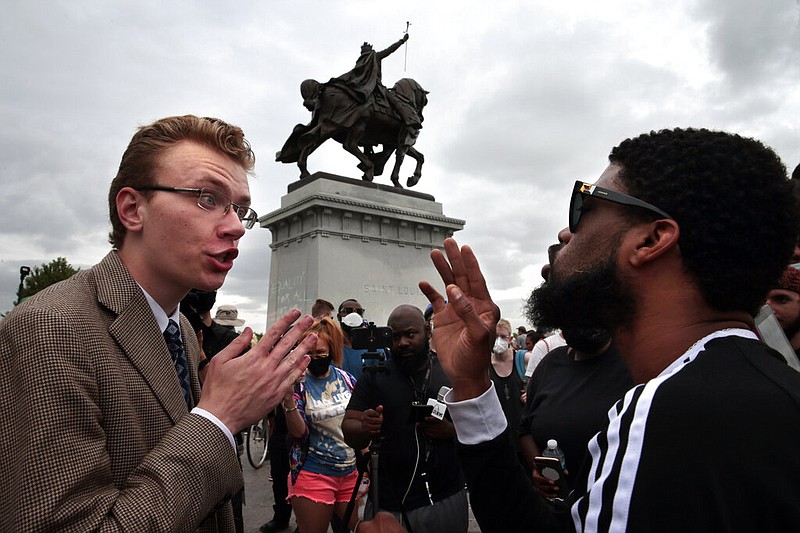 Protesters face off over statue of St. Louis&#39; namesake