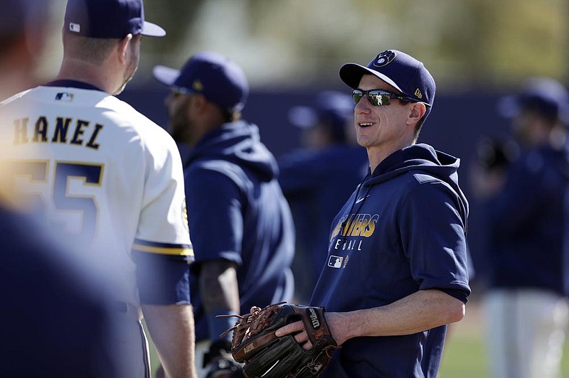 Milwaukee Brewers Manager Craig Counsell (right) said he might have 17 pitchers on the roster when the season starts in late July.
(AP/Gregory Bull)