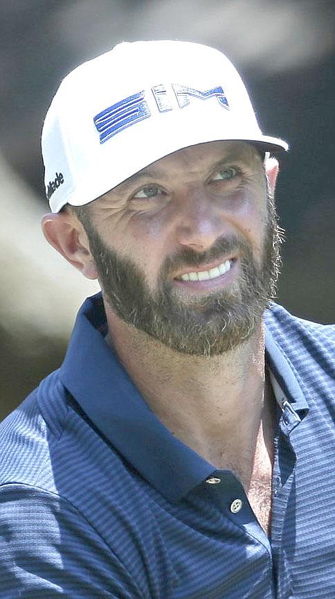 Dustin Johnson tees up on the second hole during the final round of the RBC Heritage golf tournament, Sunday, June 21, 2020, in Hilton Head Island, S.C. (AP Photo/Gerry Broome)
