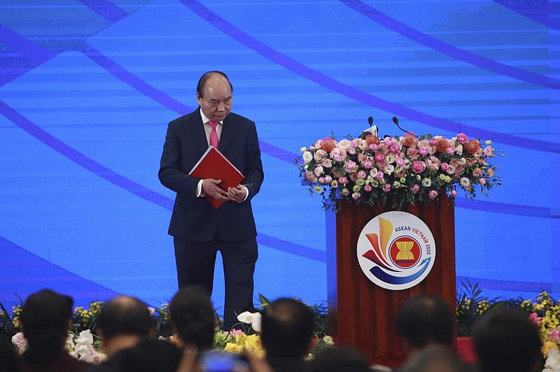 Vietnamese Prime Minister Nguyen Xuan Phuc leaves the stage Friday after delivering a speech at the opening ceremony of the 36th Association of Southeast Asian Nations Summit in Hanoi, Vietnam.
(AP/Hau Dinh)