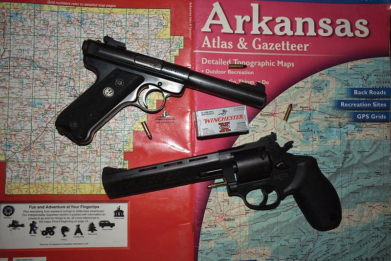 For hunting and plinking, the author prefers a 1988 Ruger Mk. II (top) and a Taurus Tracker, which also has a .22 WMR cylinder. Both are very accurate and easy to shoot.
(Arkansas Democrat-Gazette/Bryan Hendricks)