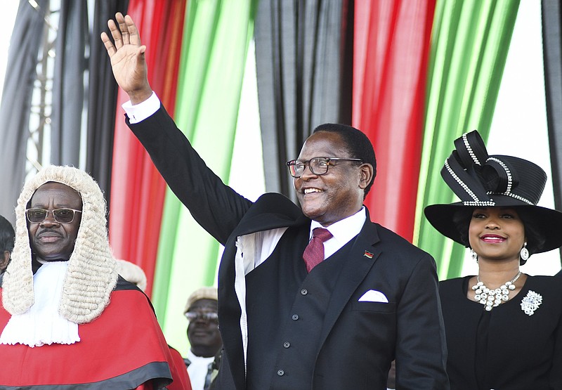 Malawi President Lazarus Chakwera greets supporters in the capital, Lilongwe, after being sworn in Sunday. Video at arkan- sasonline.com/629malawi/. (AP/Thoko Chikondi) 
