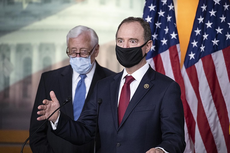 Rep. Adam Schiff, D-Calif., Chairman of the House Intelligence Committee, right, speaks accompanied by House Majority Leader Steny Hoyer of Md., during a news conference on Capitol Hill, after a meeting at the White House, Tuesday, June 30, 2020 in Washington. 