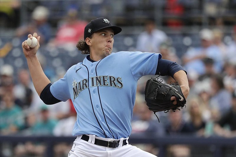 Rebuilding teams that were hoping to see their young prospects — such as former first-round pick Logan Gilbert of the Seattle Mariners — play in the majors this season are taking another look at their plans as preparations for a shortened season are under way. (AP/Elaine Thompson) 