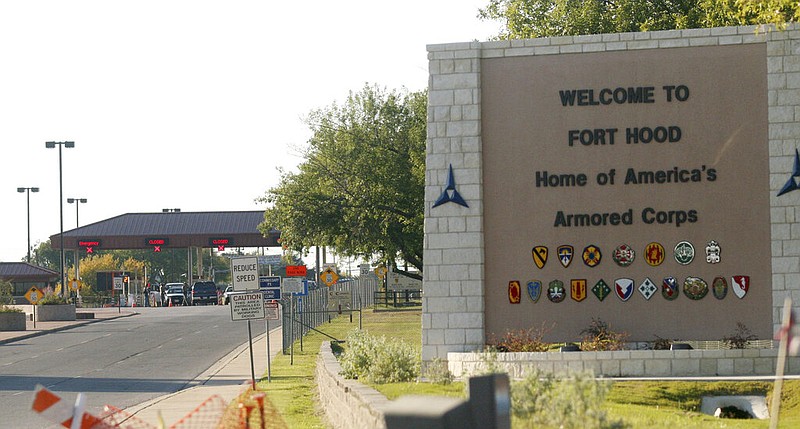 The entrance to Fort Hood Army Base near Killeen, Texas, is shown in this Nov. 5, 2009, file photo. Although President Donald Trump has vowed not to change the name of Fort Hood, critics say there are Americans more deserving of having an Army base named after them than Confederate Gen. John Bell Hood, who is perhaps best remembered for unsuccessful attempts to break U.S. Gen. William T. Sherman's siege of Atlanta in 1864. On Sept. 2, 1864, Hood evacuated the city, burning military supplies and installations in the process. He then suffered setbacks in Tennessee, gave himself up to Union forces in May 1865, and died in 1879 of yellow fever.