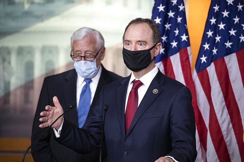 Rep. Adam Schiff, D-Calif., Chairman of the House Intelligence Committee, right, speaks accompanied by House Majority Leader Steny Hoyer of Md., during a news conference on Capitol Hill, after a meeting at the White House, Tuesday, June 30, 2020 in Washington. (AP Photo/Alex Brandon)

