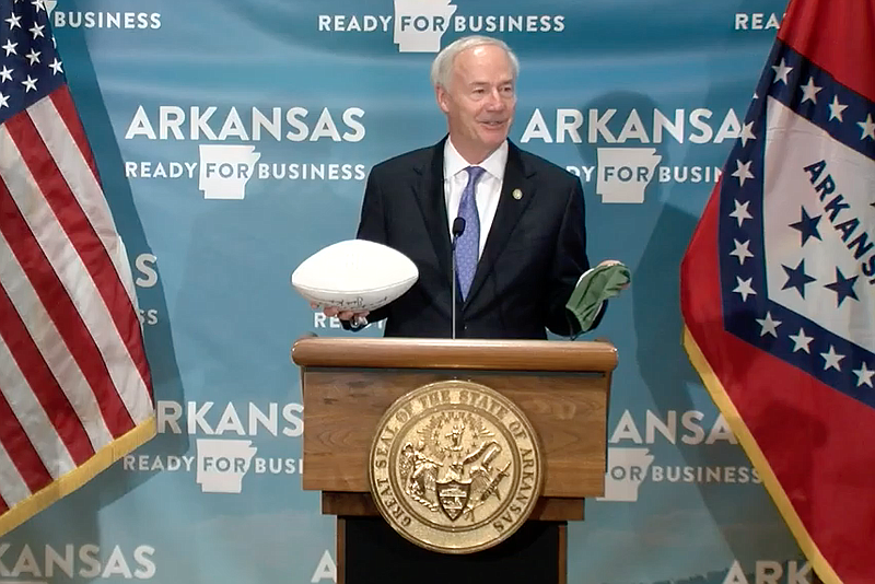 Arkansas Gov. Asa Hutchinson speaks to reporters at the state Capitol in Little Rock on Wednesday in this still of video provided by the governor's office. 