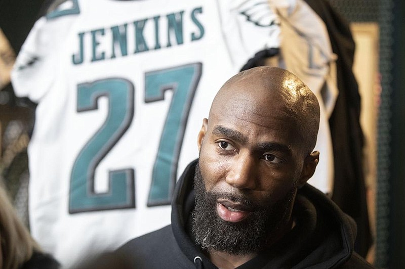 New Orleans Saints safety Malcolm Jenkins, shown earlier this year conducting an interview while with the Philadelphia Eagles, is among the NFL players raising concerns about playing football amid the coronavirus pandemic. Jenkins said last week that “football is a nonessential business so we don’t need to do it.”
(AP/Matt Rourke)