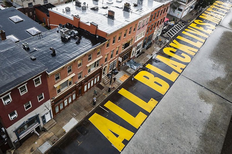 This “All Black Lives Matter” message was painted Saturday on Halsey Street in Newark, N.J.
(AP/John Minchillo)