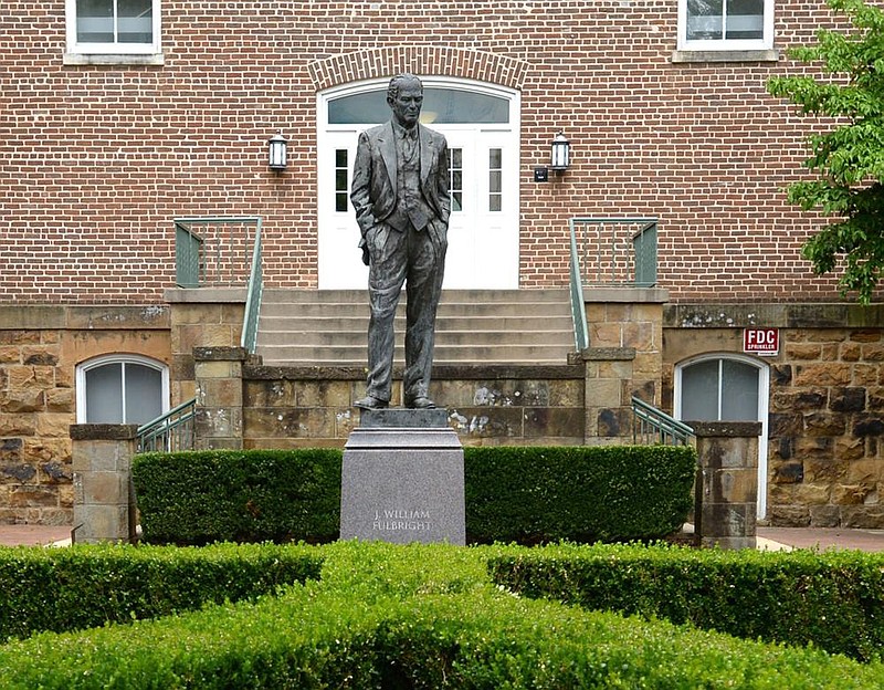 A statue of J. William Fulbright stands Wednesday near the west entrance of Old Main on the University of Arkansas, Fayetteville campus. The statue was dedicated in 2002.
(NWA Democrat-Gazette/Andy Shupe)