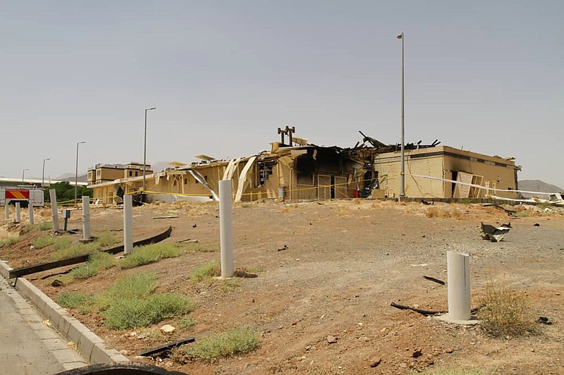 This photo released Thursday, July 2, 2020, by the Atomic Energy Organization of Iran, shows a building after it was damaged by a fire, at the Natanz uranium enrichment facility some 200 miles (322 kilometers) south of the capital Tehran, Iran. A fire burned the building above Iran's underground Natanz nuclear enrichment facility, though officials say it did not affect its centrifuge operation or cause any release of radiation. The Atomic Energy Organization of Iran sought to downplay the fire Thursday, calling it an "incident" that only affected an "industrial shed." (Atomic Energy Organization of Iran via AP)