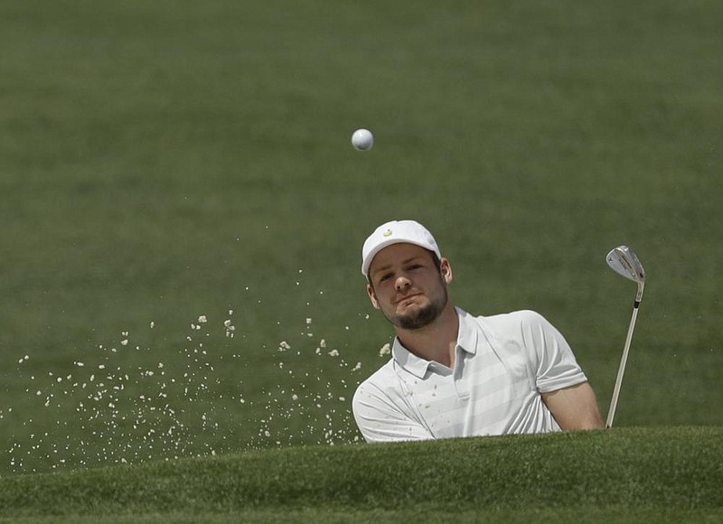 Doc Redman hits from a bunker on the second hole during the second round at the Masters golf tournament Friday, April 6, 2018, in Augusta, Ga. (AP Photo/Matt Slocum)