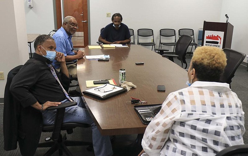 Members of the Metropolitan Housing Authority Commission including, left to right, Louis Jackson, H. Lee Lindsey, Kenyon Lowe, and Leta Anthony chose an interim executive director Thursday July 2, 2020 during a commission meeting in Little Rock. The commission selected Nadine Jarmon, a housing professional who previously worked in Florida, as the agency‚Äôs interim executive director. (Arkansas Democrat-Gazette/Staton Breidenthal)