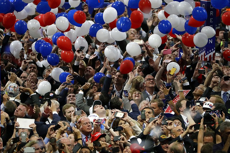 Confetti and balloons fall during celebrations after then-candidate Donald Trump's acceptance speech on the final day of the Republican National Convention in Cleveland in this July 21, 2016, file photo.